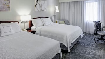 Premium bedding, desk, laptop workspace, iron/ironing board