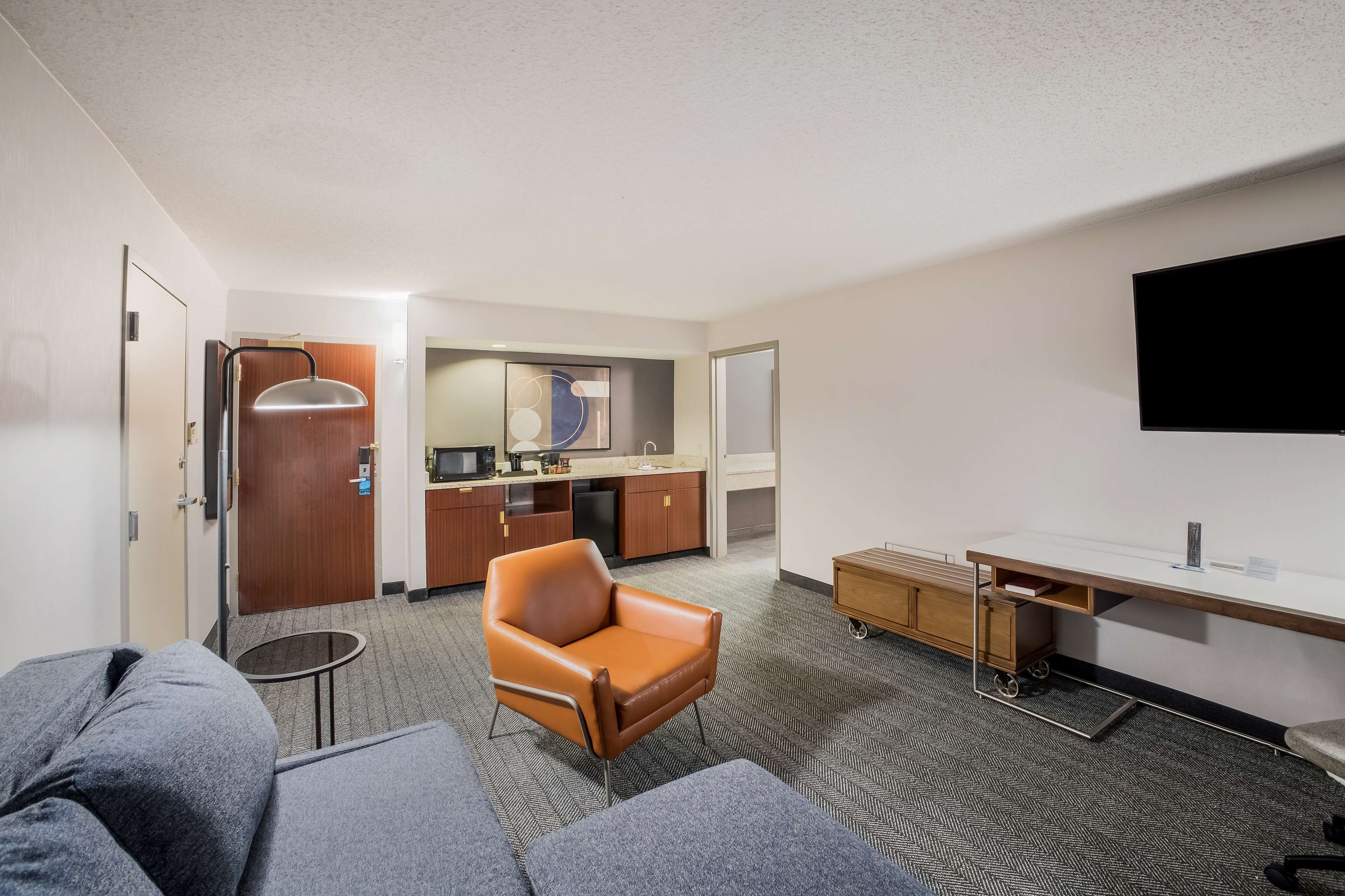 premium bedding, desk, laptop workspace, blackout curtains