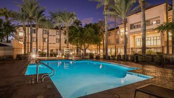 Outdoor pool, open 7:00 AM to 10:00 PM, pool umbrellas, sun loungers