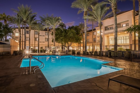 Outdoor pool, open 7:00 AM to 10:00 PM, pool umbrellas, pool loungers