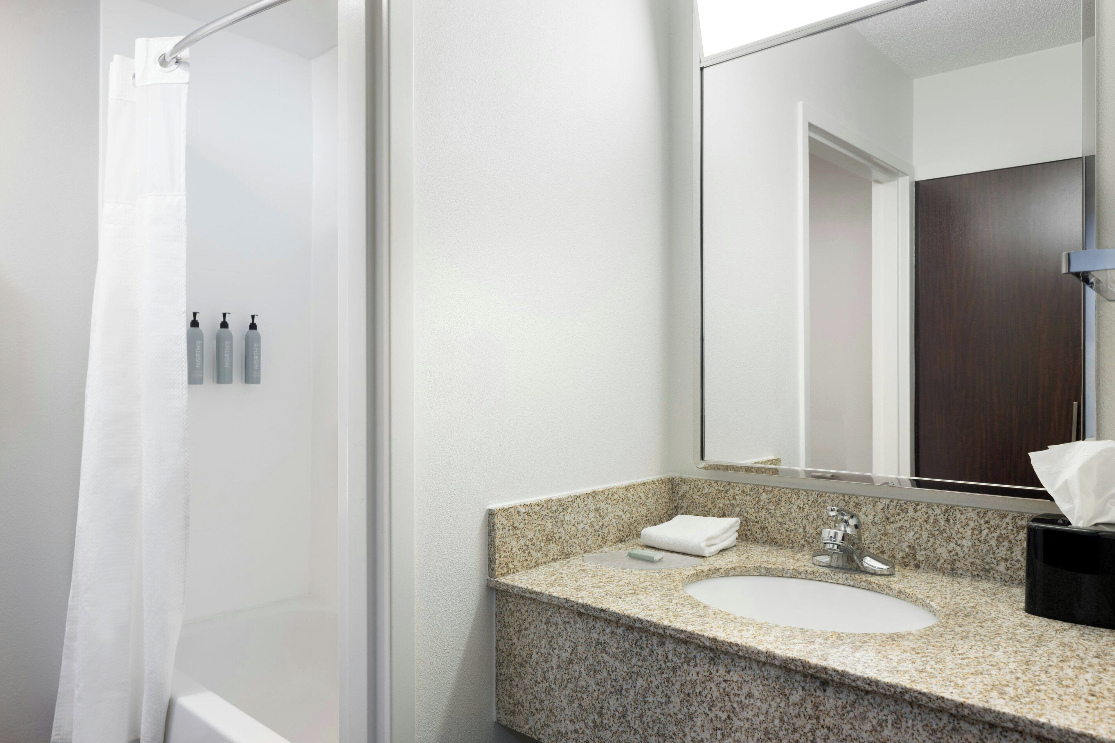 combined shower/bathtub, free toiletries, hair dryer, towels