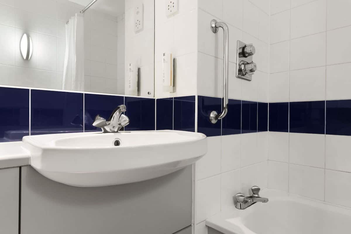 shower, eco-friendly toiletries, hair dryer, towels