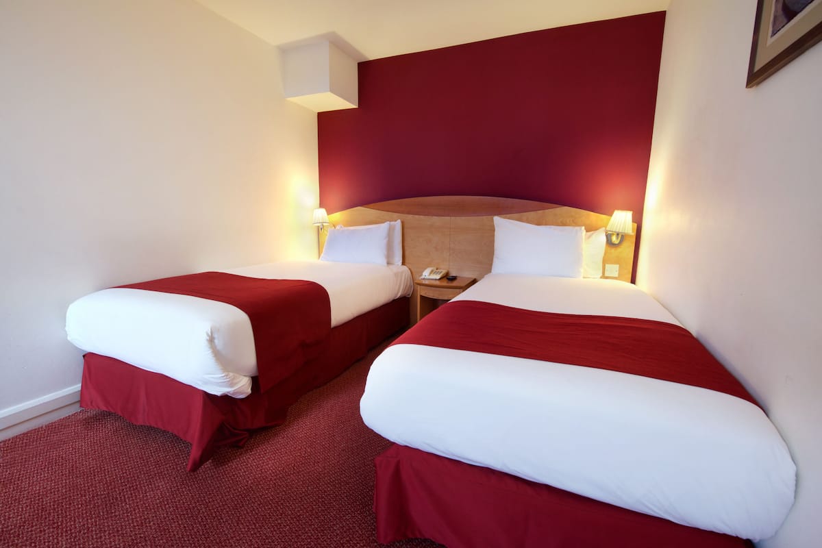 Desk, free WiFi, bed sheets