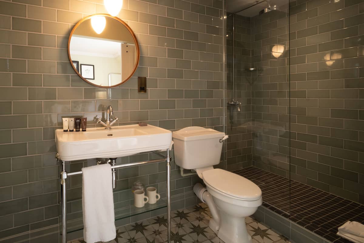 snug room | bathroom | designer toiletries, hair dryer, towels
