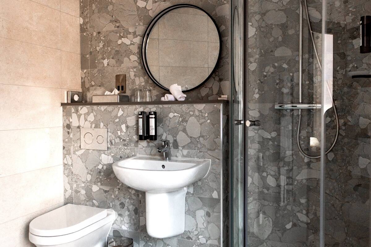 comfort double room, ground floor | bathroom | designer toiletries, hair dryer, towels, soap