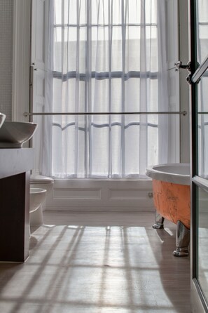 Superior Suite, 1 King Bed | Bathroom | Designer toiletries, hair dryer, towels, soap