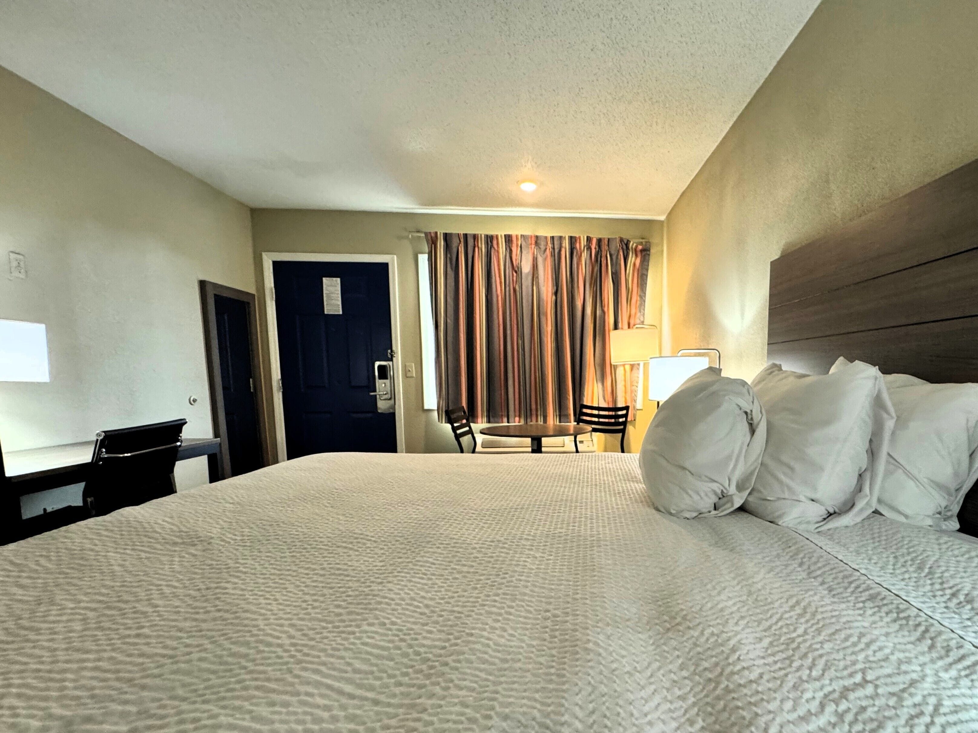 Room, 1 King Bed, Accessible, Non Smoking (Roll-in Shower) | Individually decorated, individually furnished, desk, laptop workspace