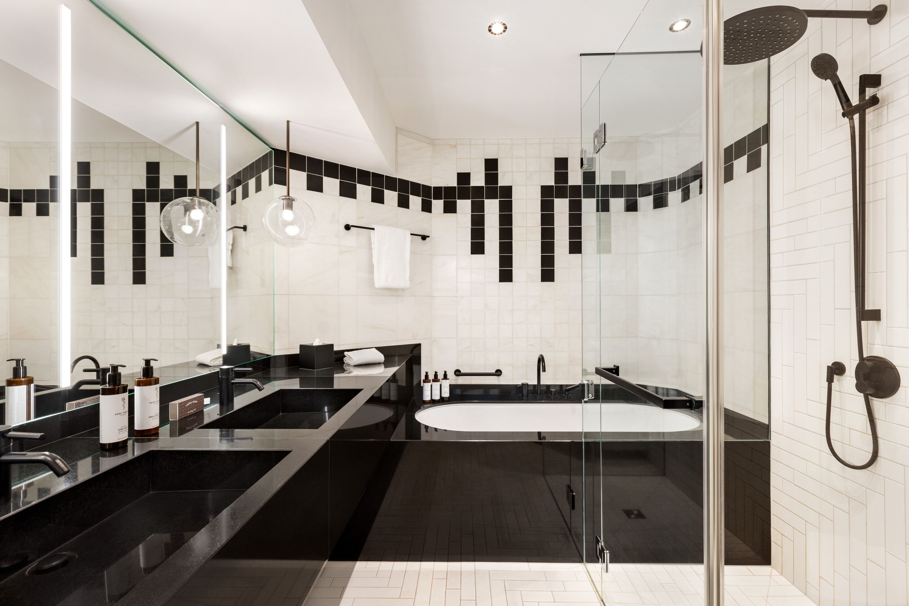 superior suite | bathroom | eco-friendly toiletries, hair dryer, towels