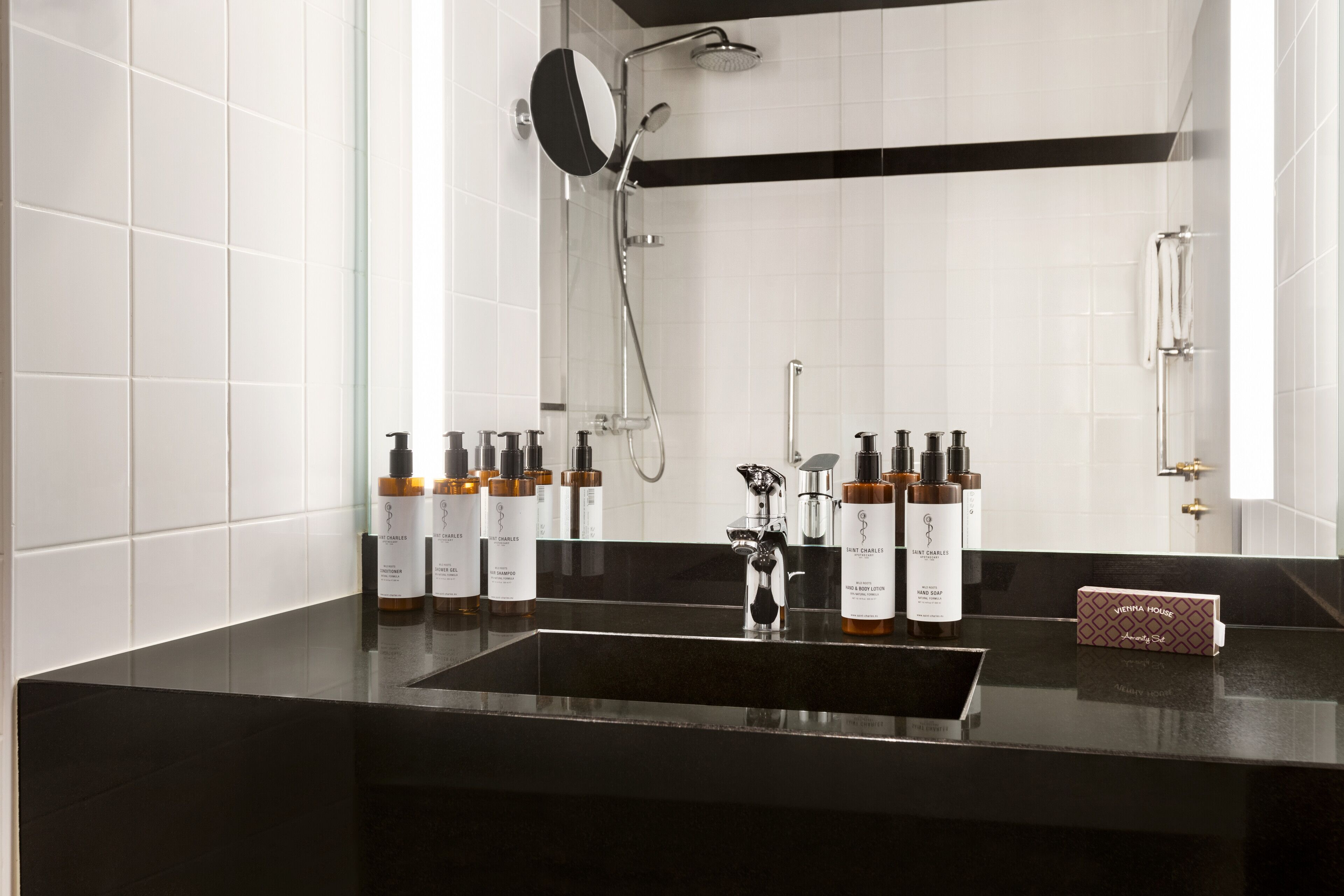 eco-friendly toiletries, hair dryer, towels