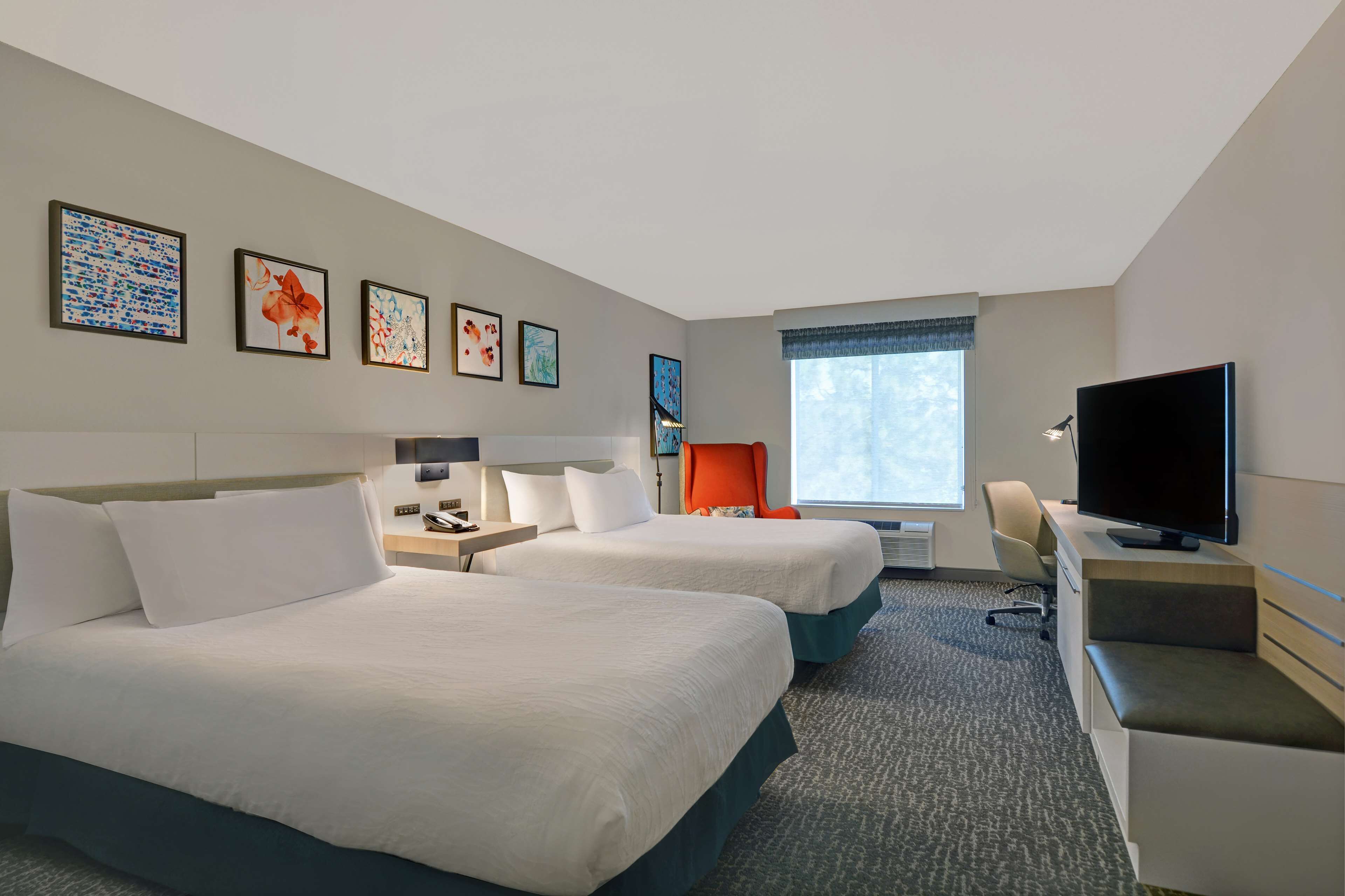 premium bedding, down duvets, pillow-top beds, in-room safe