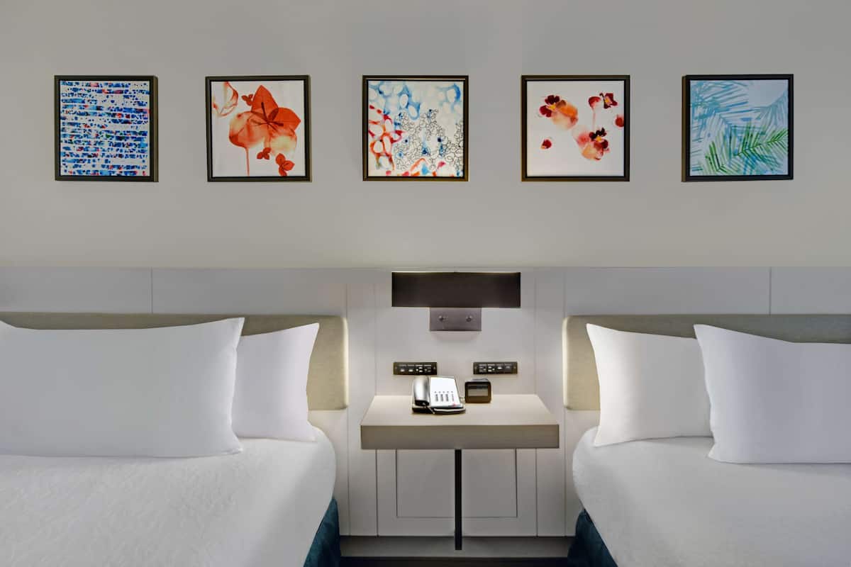 premium bedding, down duvets, pillow-top beds, in-room safe