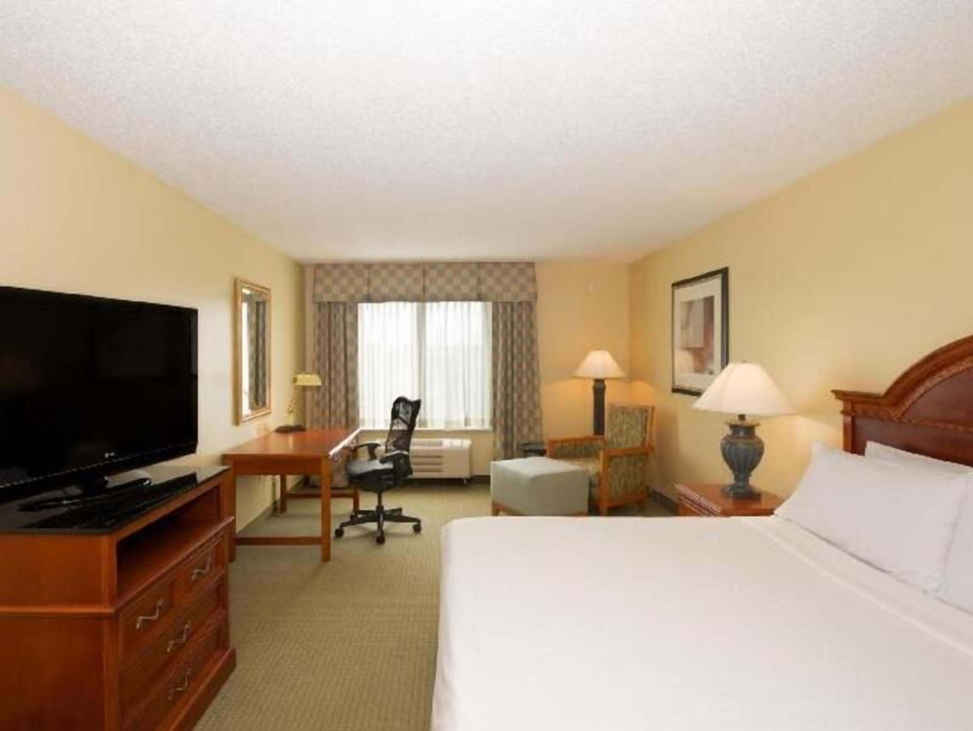 Premium bedding, down duvets, pillow-top beds, in-room safe