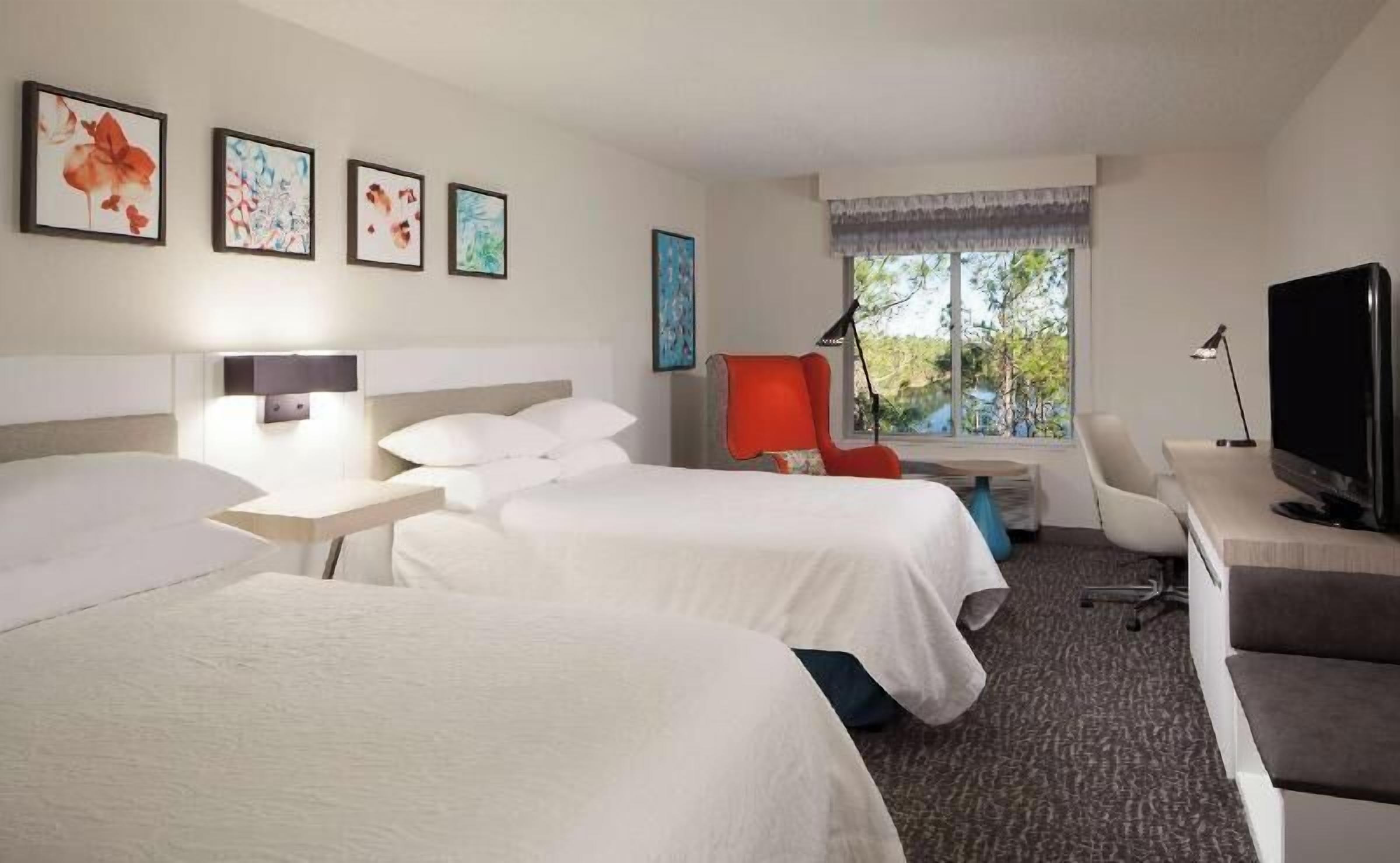 Premium bedding, down duvets, pillow-top beds, in-room safe