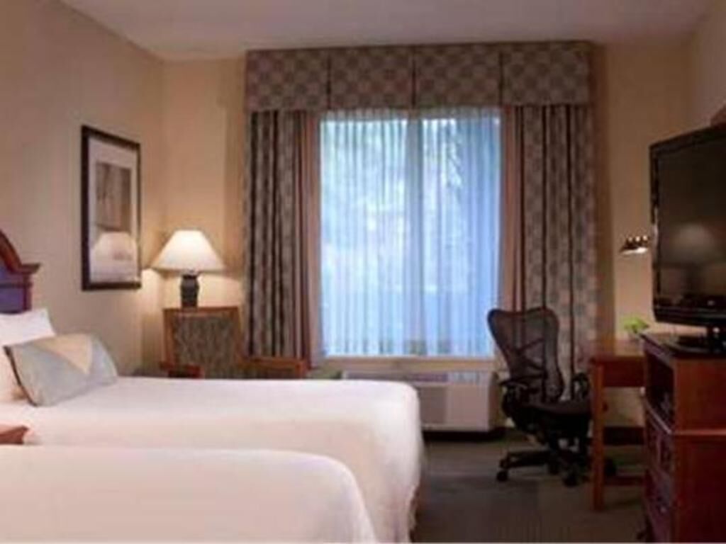 Premium bedding, down duvets, pillow-top beds, in-room safe