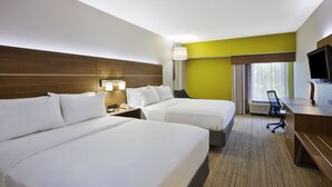 A hotel room with two beds, a desk with a chair, a TV, and a window with curtains. - Holiday Inn Express & Suites Milford by IHG (Milford)