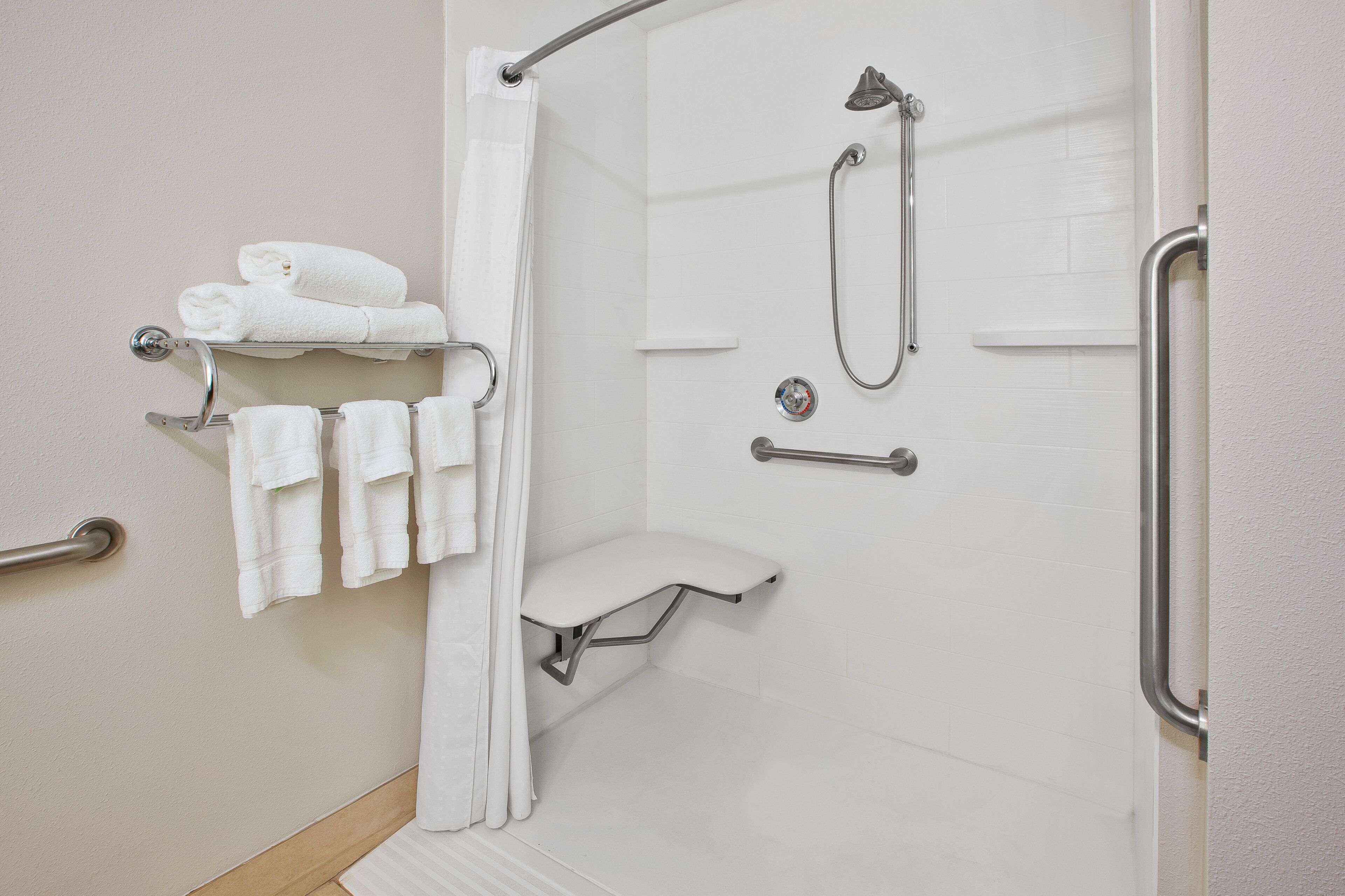suite, 1 queen bed, accessible (hearing, roll-in shower) | bathroom | free toiletries, hair dryer, towels