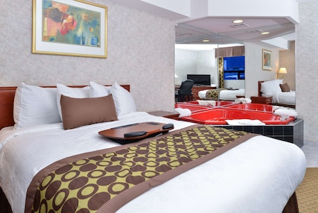 Suite, 1 Queen Bed, Non Smoking, Jetted Tub | Individually decorated, individually furnished, desk, blackout drapes