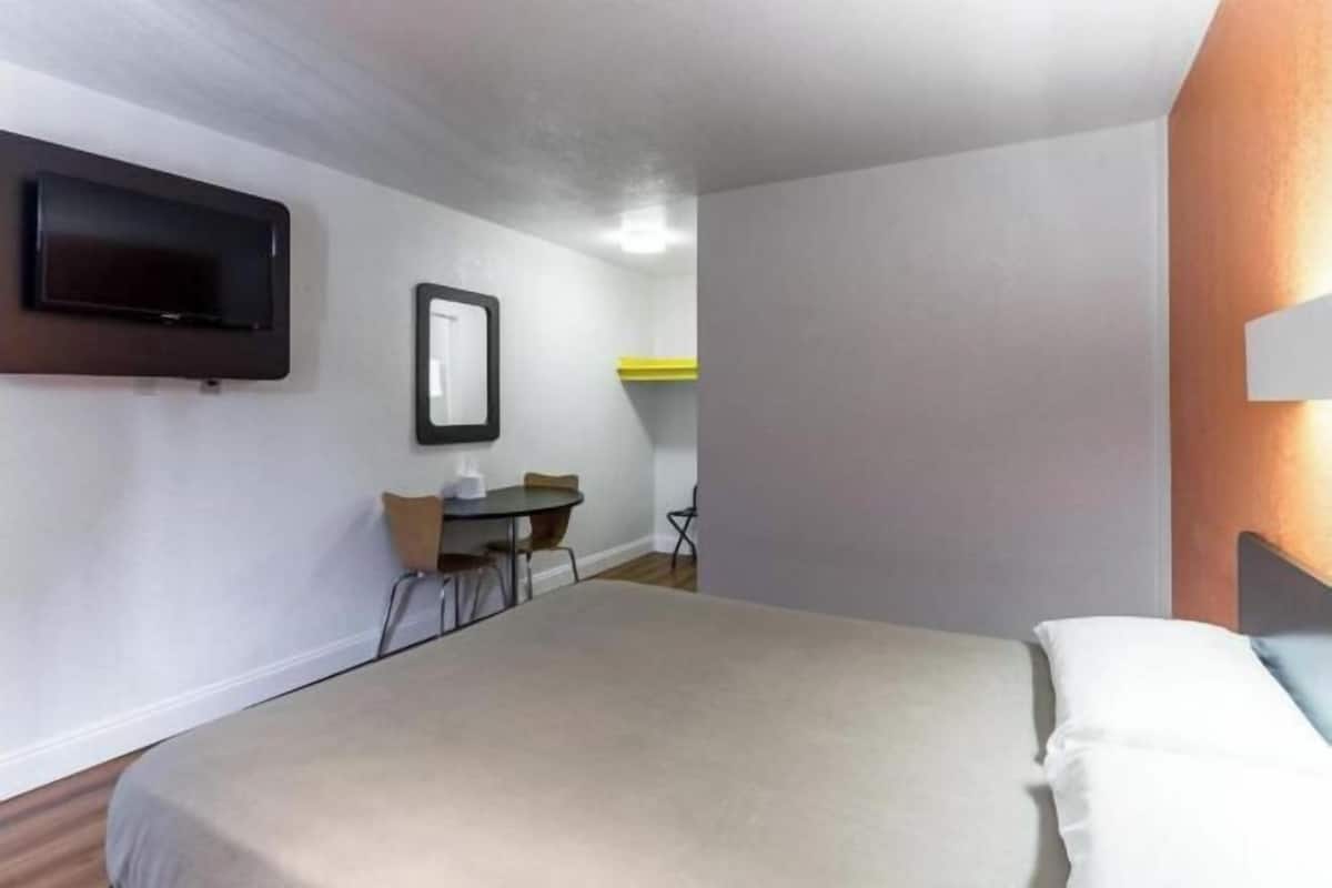 Iron/ironing board, bed sheets, alarm clocks