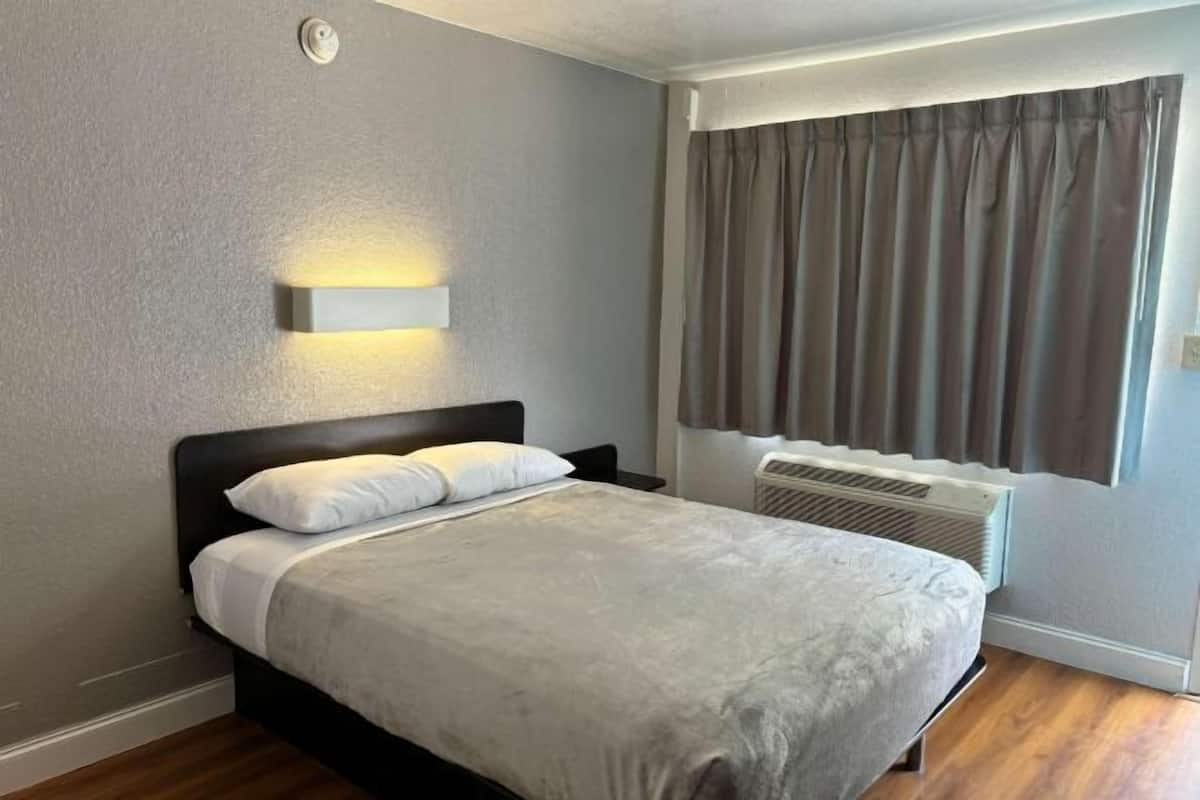 Iron/ironing board, bed sheets, alarm clocks