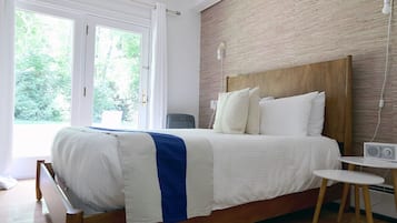 Queen with Patio ADA | Premium bedding, down comforters, pillowtop beds, free WiFi