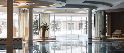 Indoor pool, 2 outdoor pools, open 7:00 AM to 8:00 PM, pool umbrellas