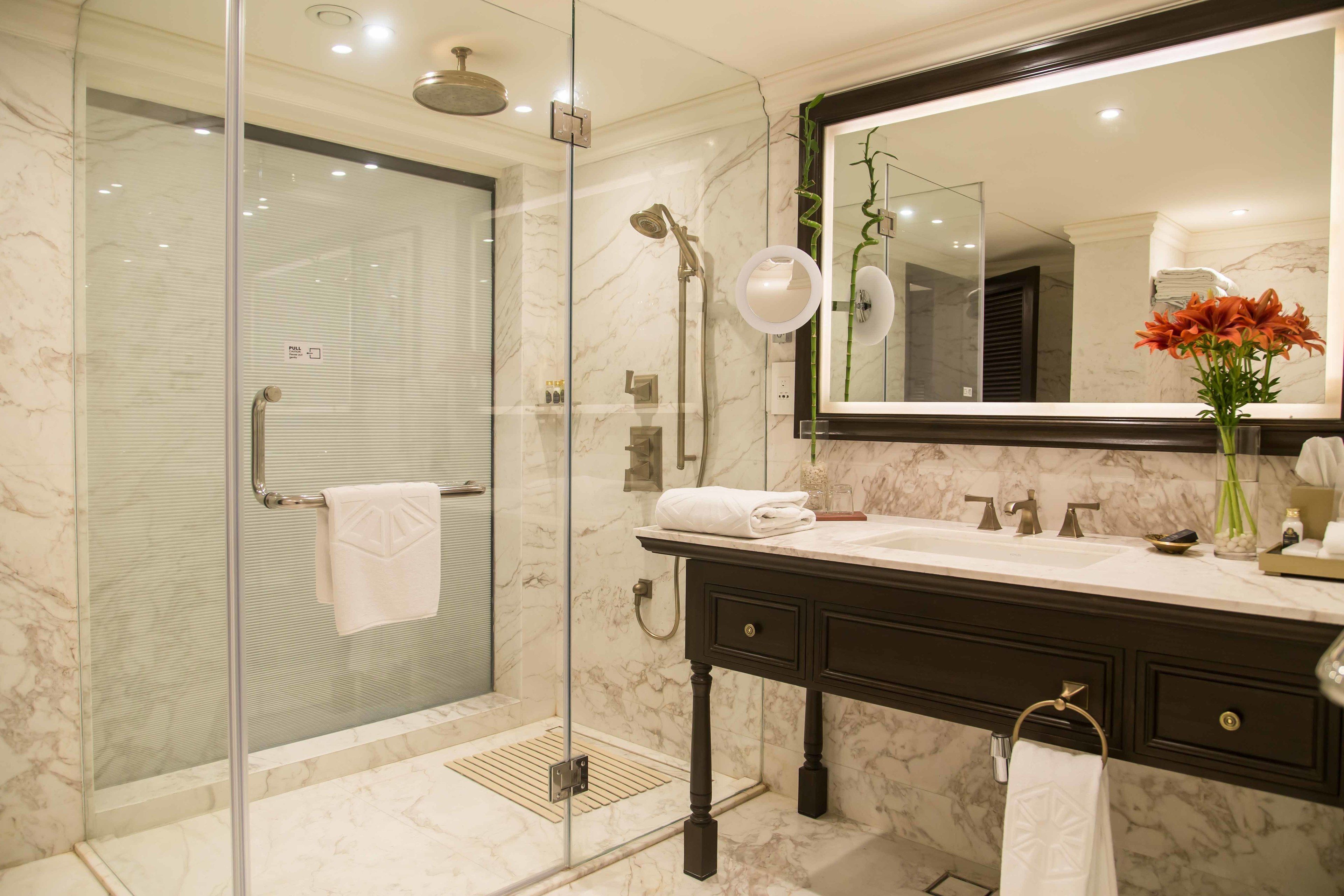 shower, designer toiletries, hair dryer, bathrobes