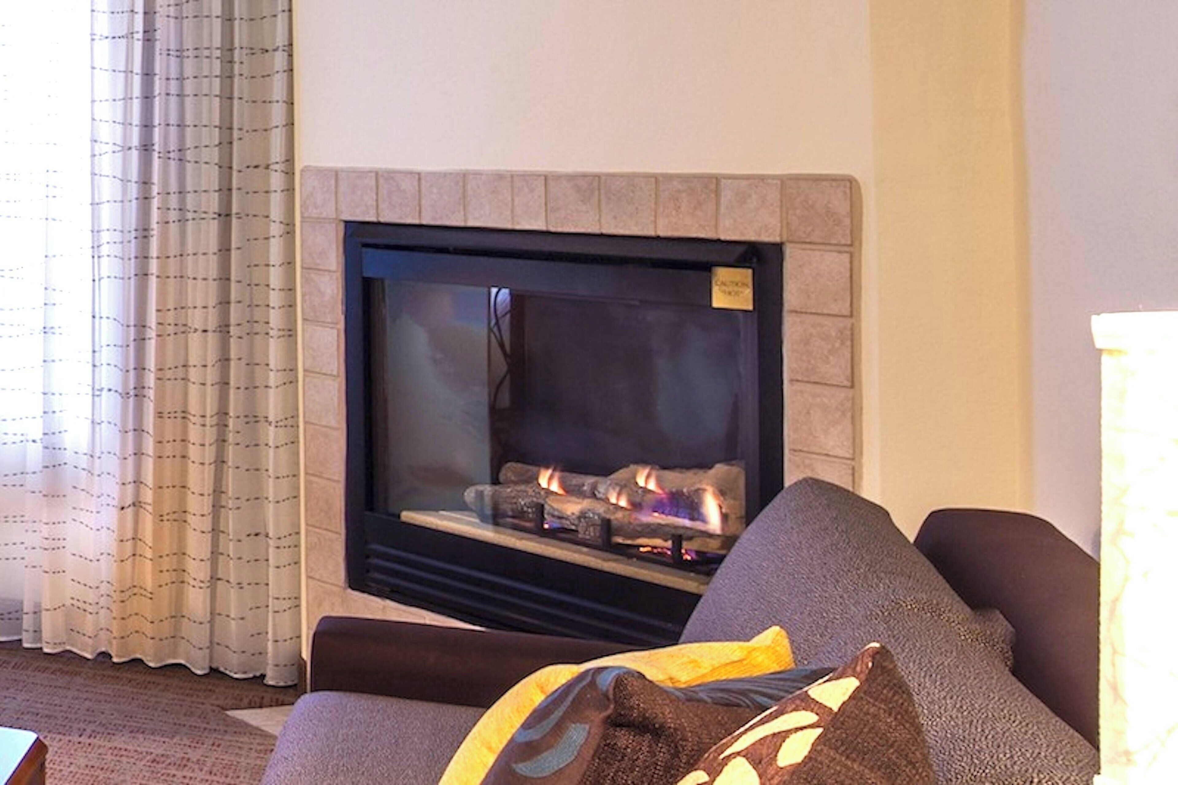 premium bedding, pillow-top beds, desk, laptop workspace