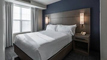 Premium bedding, pillowtop beds, desk, laptop workspace