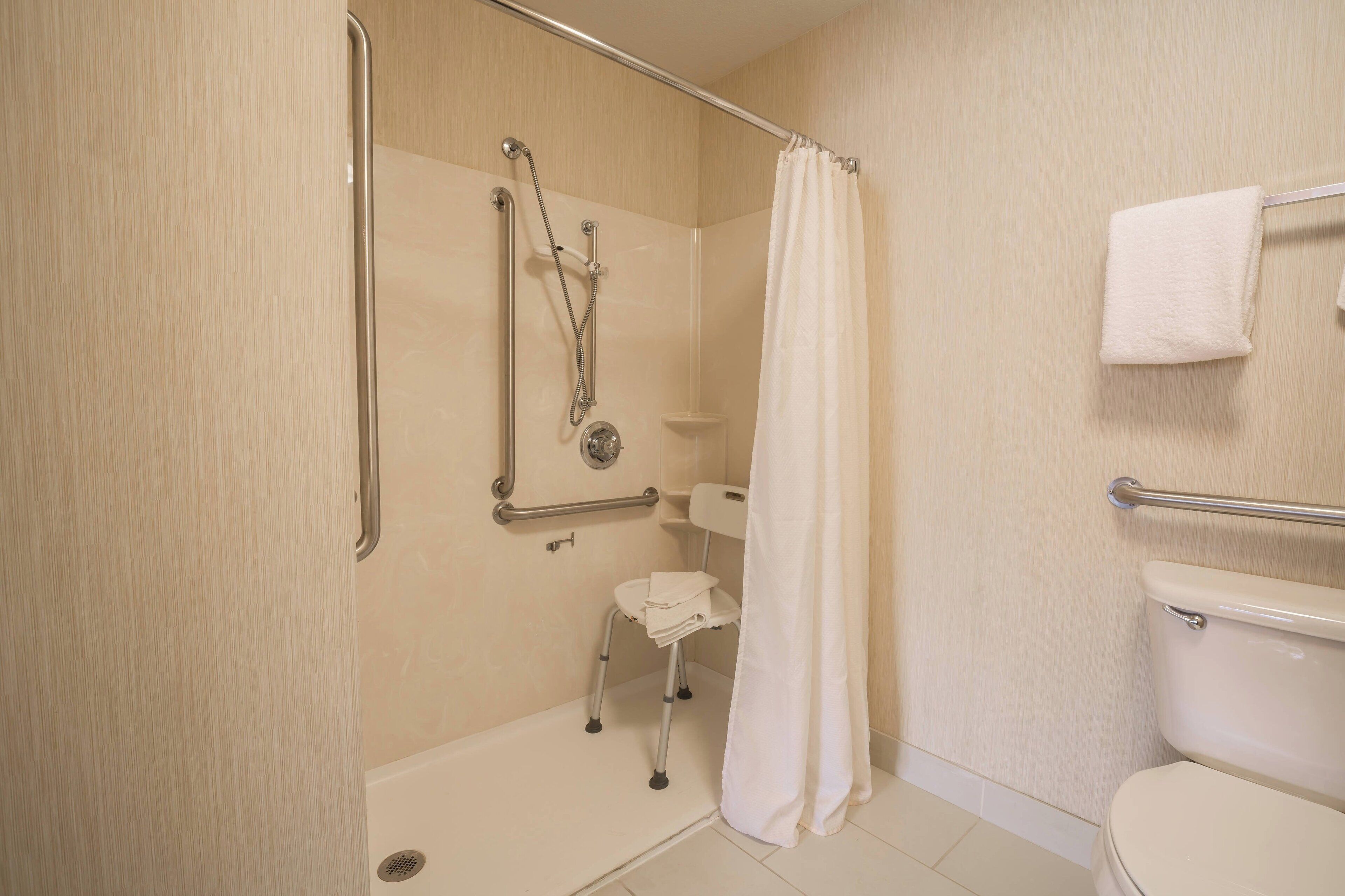 combined shower/bathtub, free toiletries, hair dryer, towels