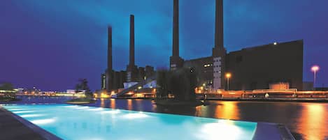 Outdoor pool, open 6:00 AM to 10:00 PM, pool loungers