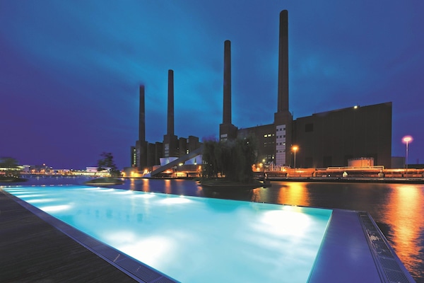 Outdoor pool, open 6:00 AM to 10:00 PM, sun loungers