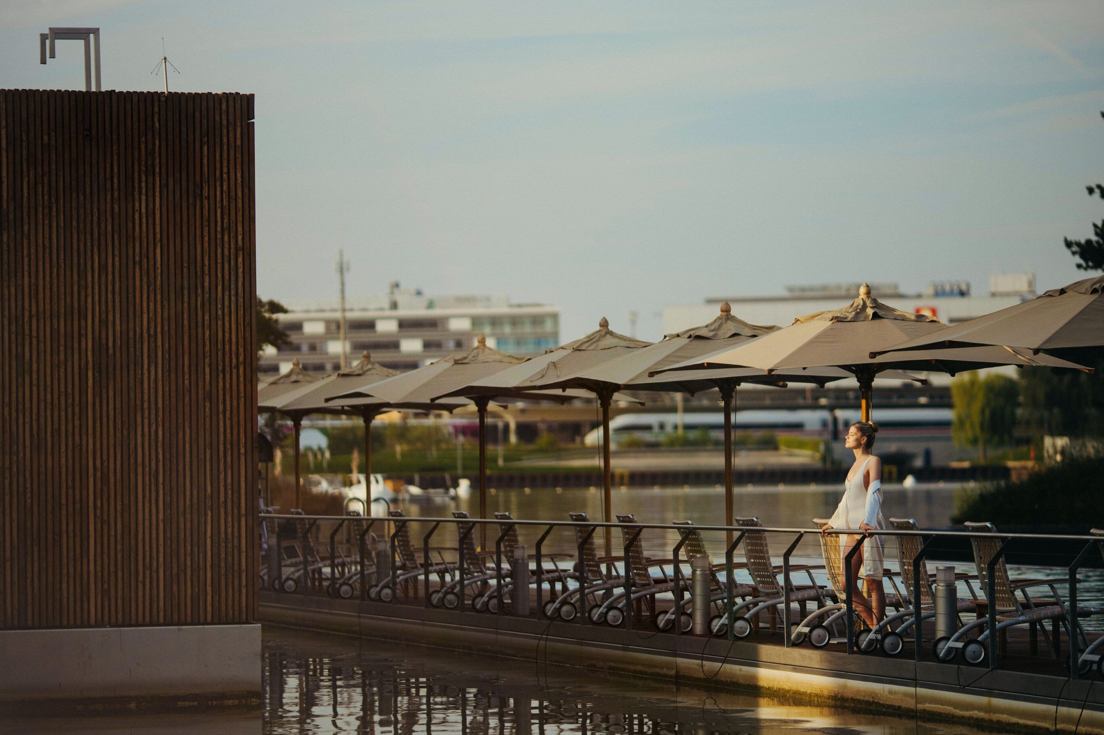 outdoor pool, open 6:00 am to 10:00 pm, pool loungers