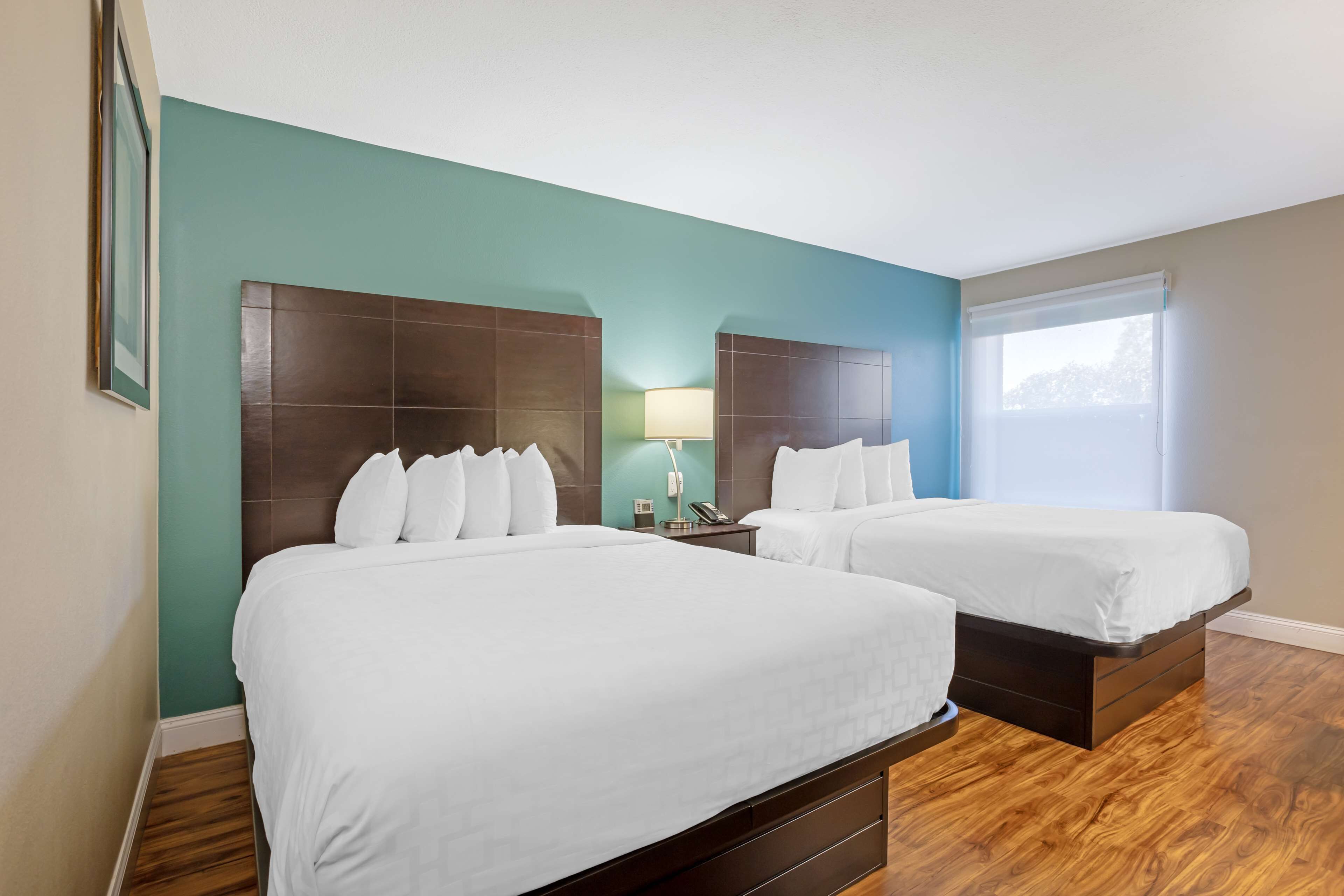 standard room, 2 queen beds, non smoking, refrigerator & microwave (pet friendly) | pillow-top beds, desk, laptop workspace, iron/ironing board