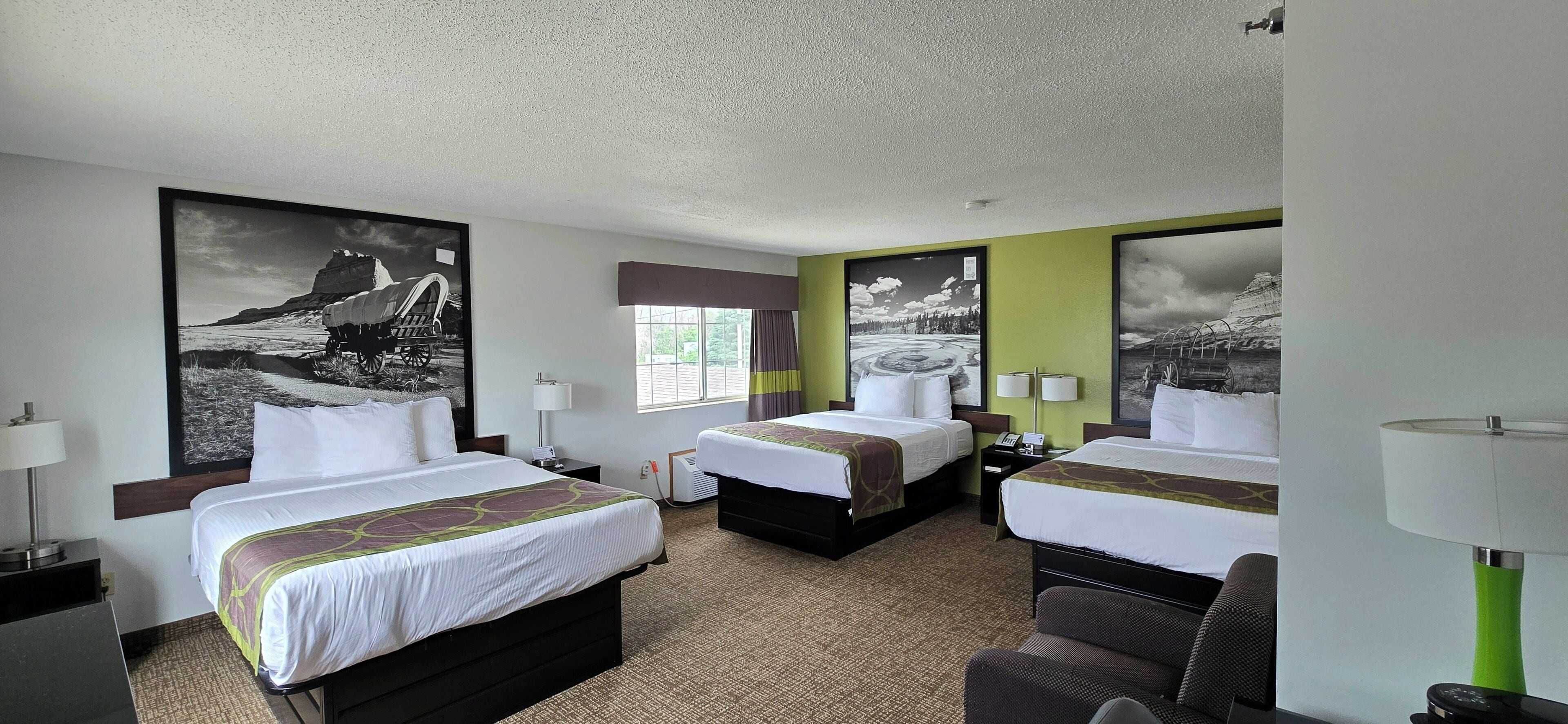 Superior Queen Suite, 3 Queen Beds, Non Smoking | Desk, WiFi (free), bed sheets