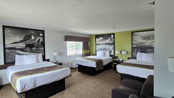 Superior Queen Suite, 3 Queen Beds, Non Smoking | Desk, WiFi (free), bed sheets