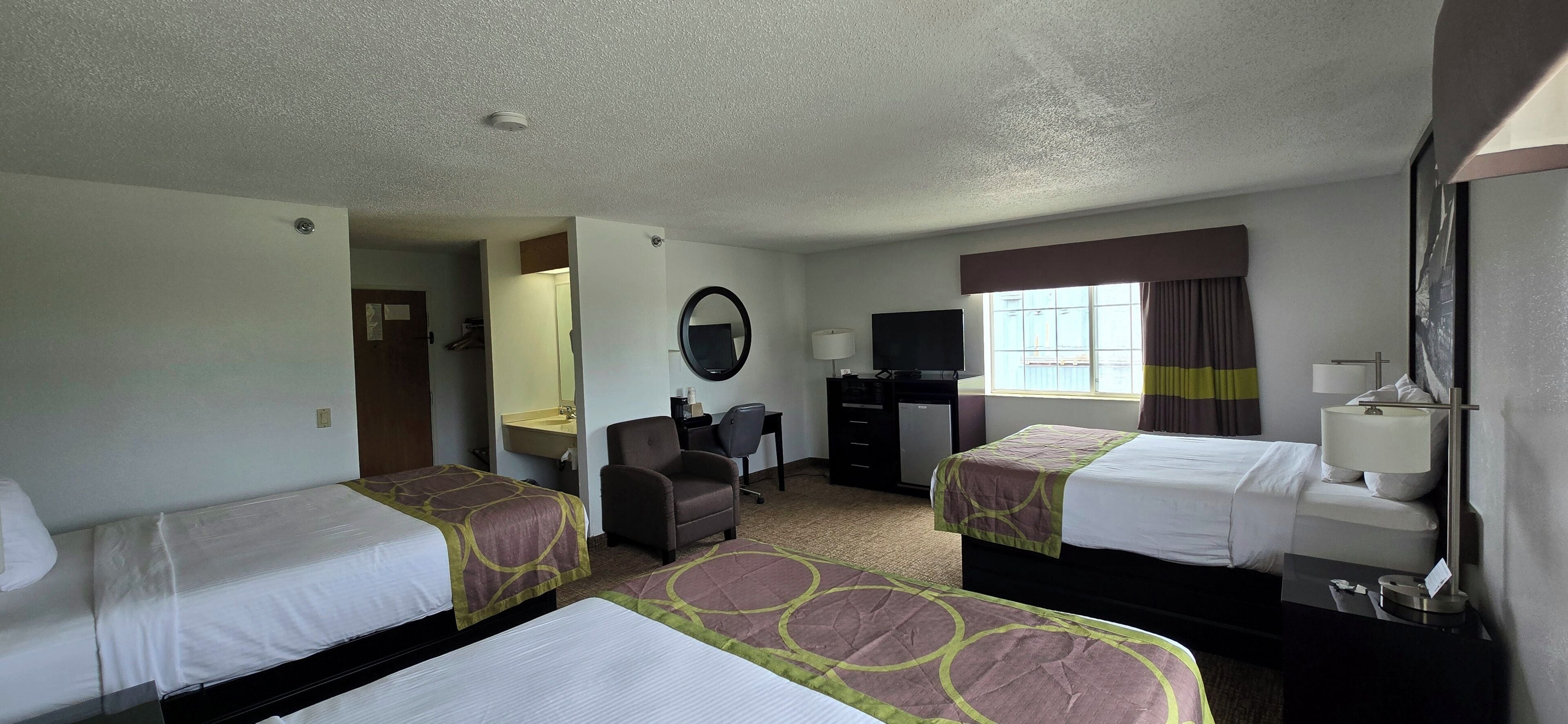 Superior Queen Suite, 3 Queen Beds, Non Smoking | Desk, WiFi (free), bed sheets