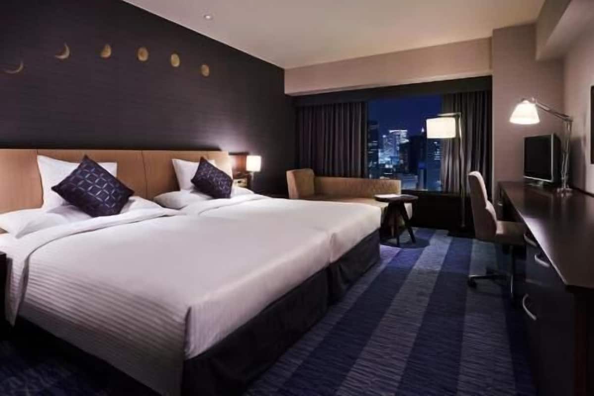 Down comforters, minibar, in-room safe, blackout drapes