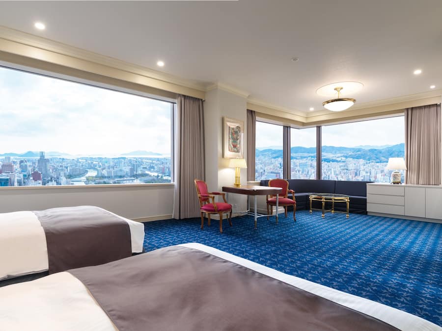 Premium bedding, down comforters, in-room safe, desk