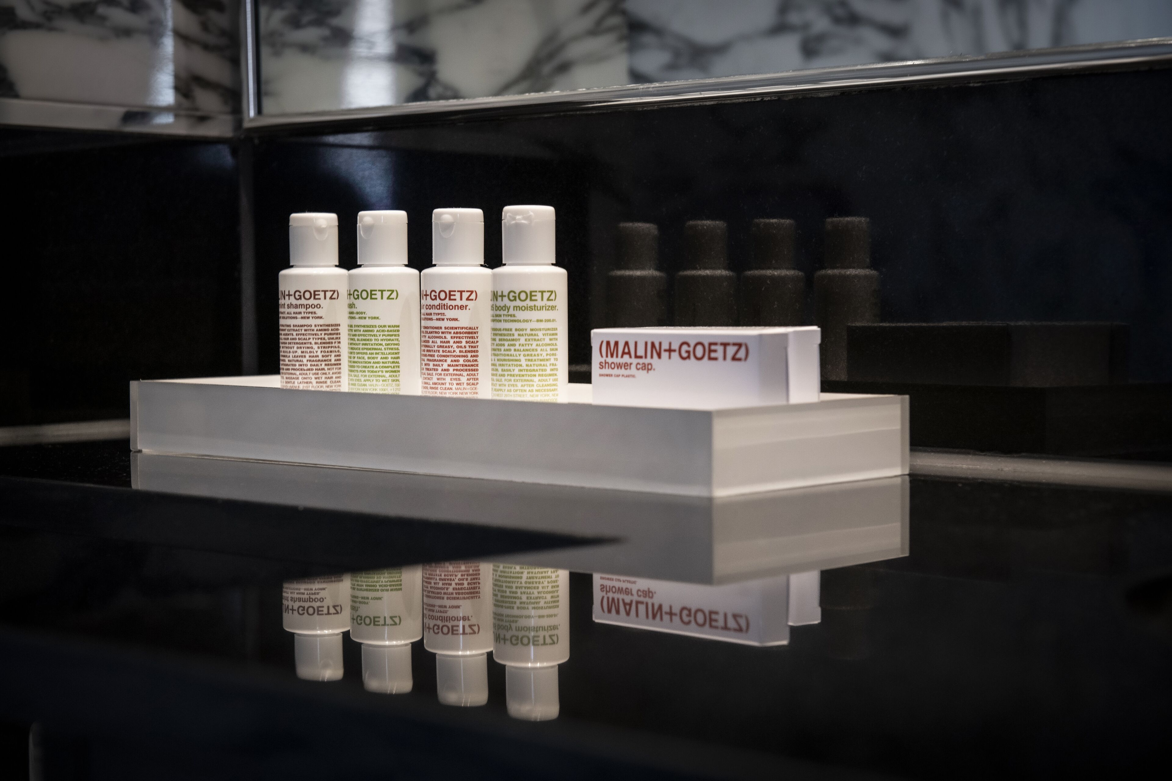 combined shower/bathtub, designer toiletries, hair dryer, bathrobes