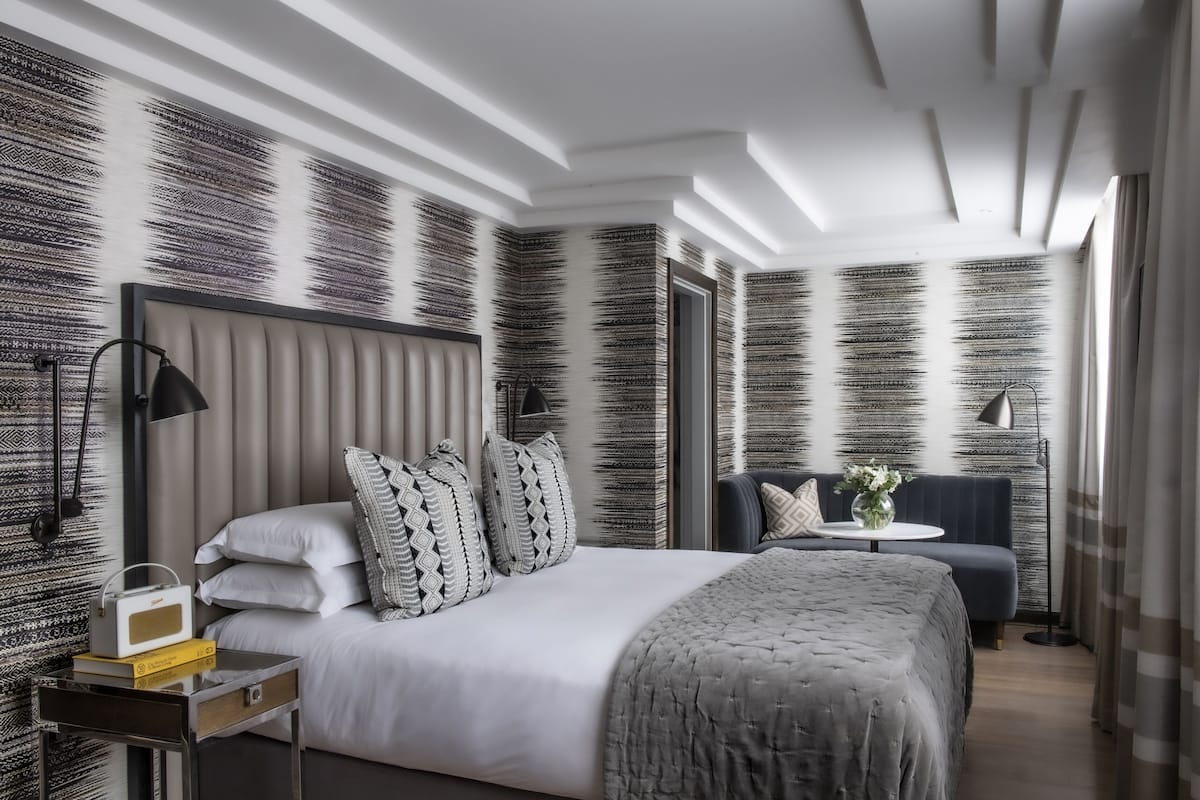 Deluxe Room, 1 King Bed | Premium bedding, minibar, in-room safe, individually decorated