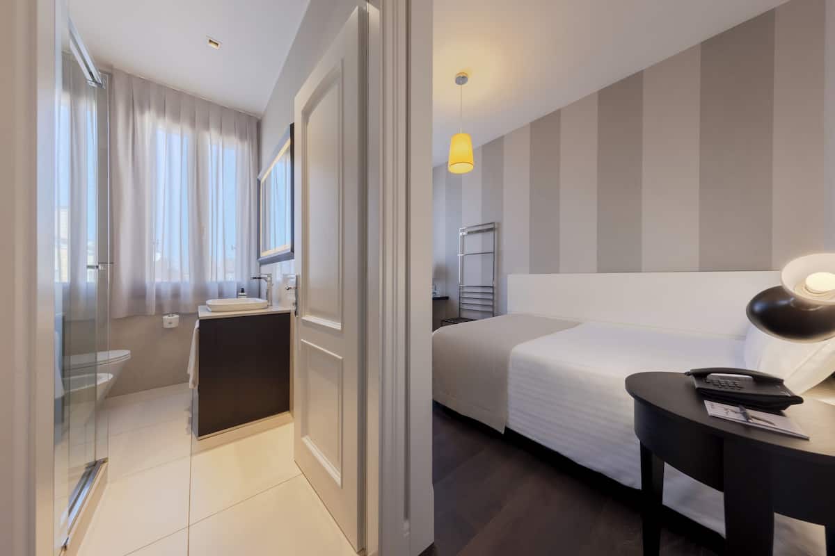 Premium bedding, down duvets, pillow-top beds, minibar