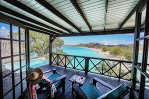 Bay View Pool Cottage | Egyptian cotton sheets, down comforters, pillowtop beds, minibar