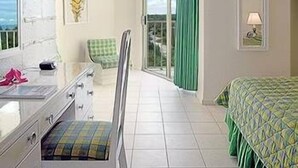In-room safe, blackout curtains, iron/ironing board, cots/infant beds - Breezes Resort & Spa Trelawny All Inclusive (Falmouth)