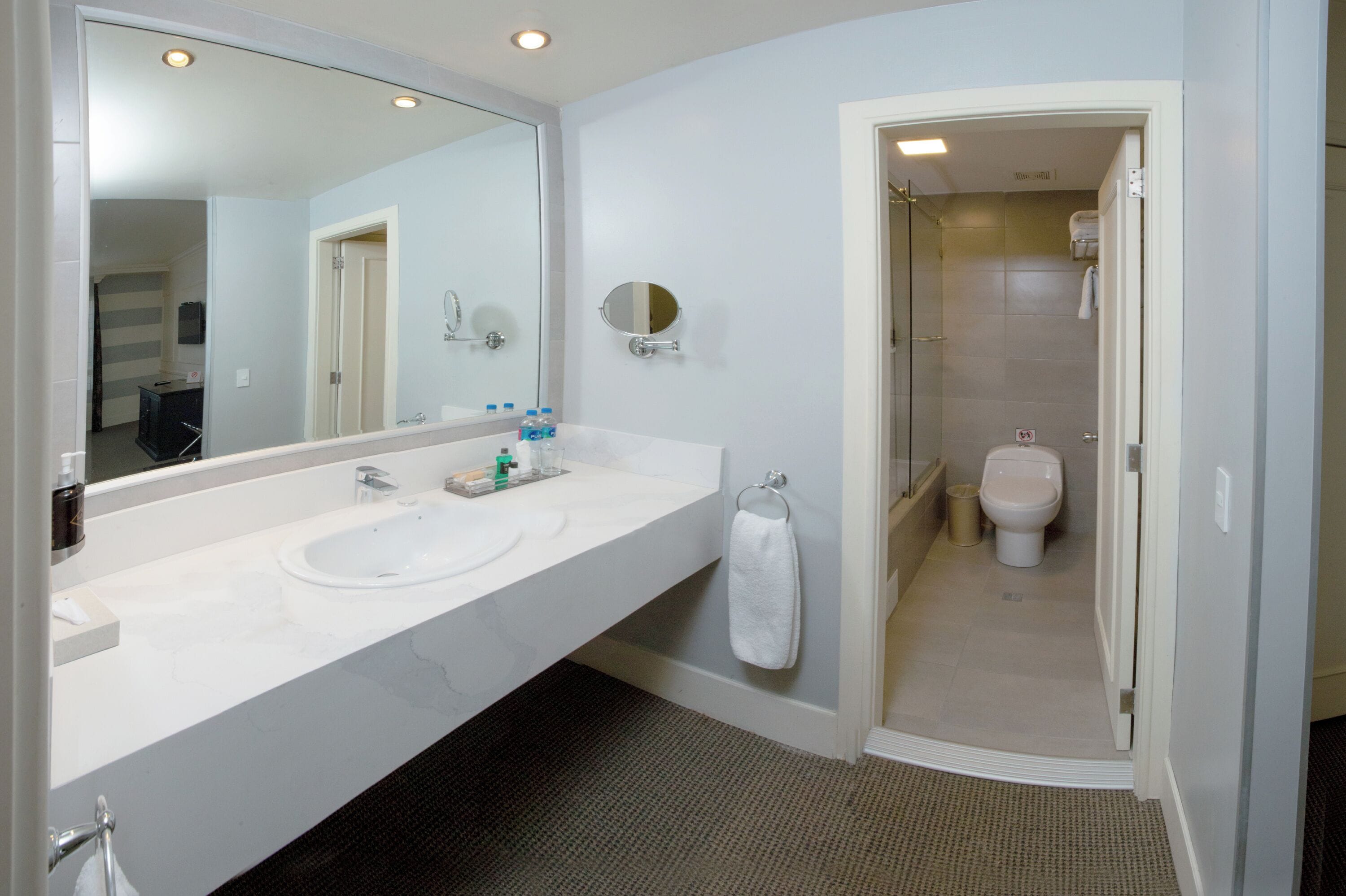 combined shower/bathtub, rainfall showerhead, eco-friendly toiletries