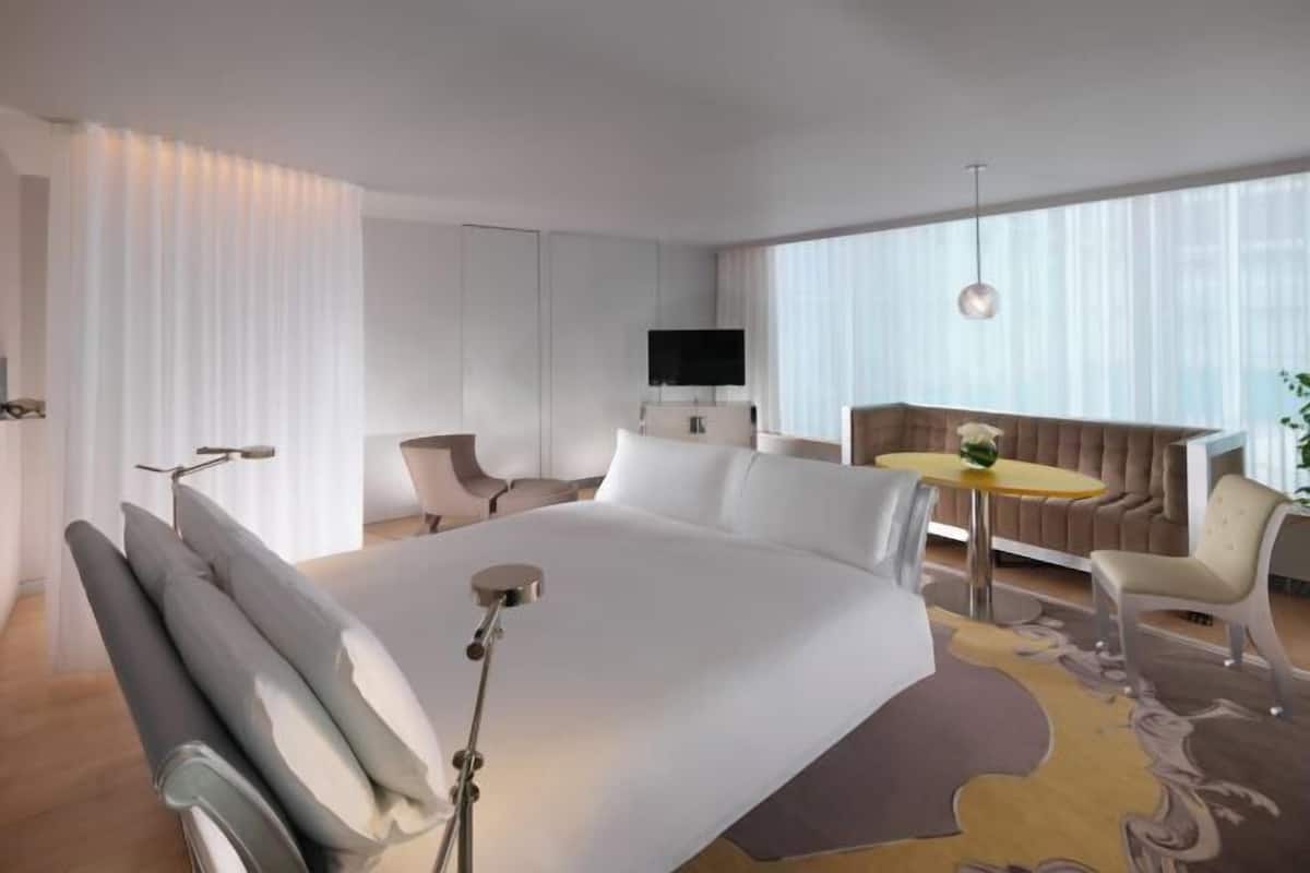 Ropa de cama de alta calidad y minibar