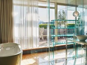 Terrace Suite | Bathroom | Designer toiletries, hair dryer, bathrobes, slippers