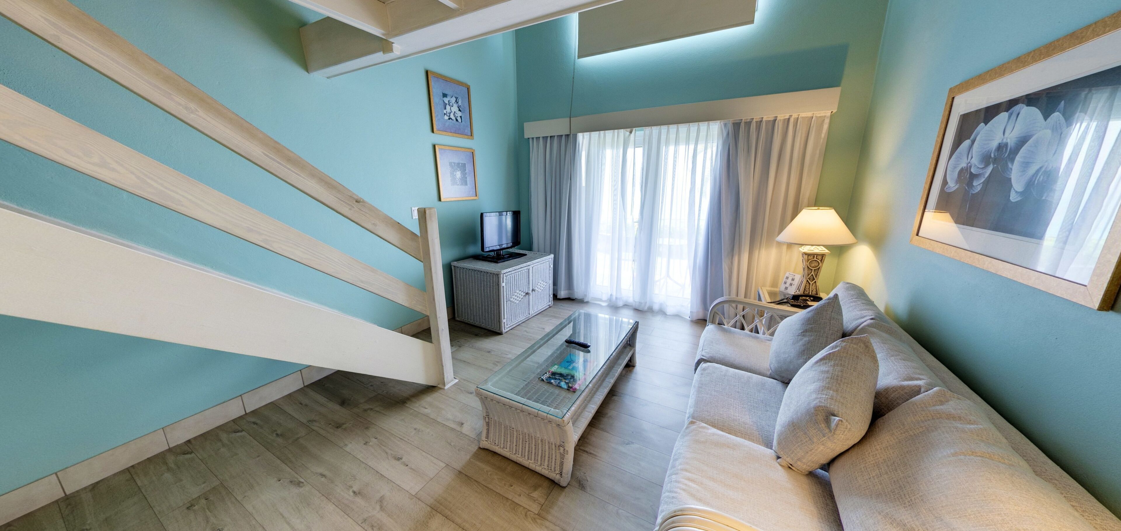 duplex | living area | flat-screen tv