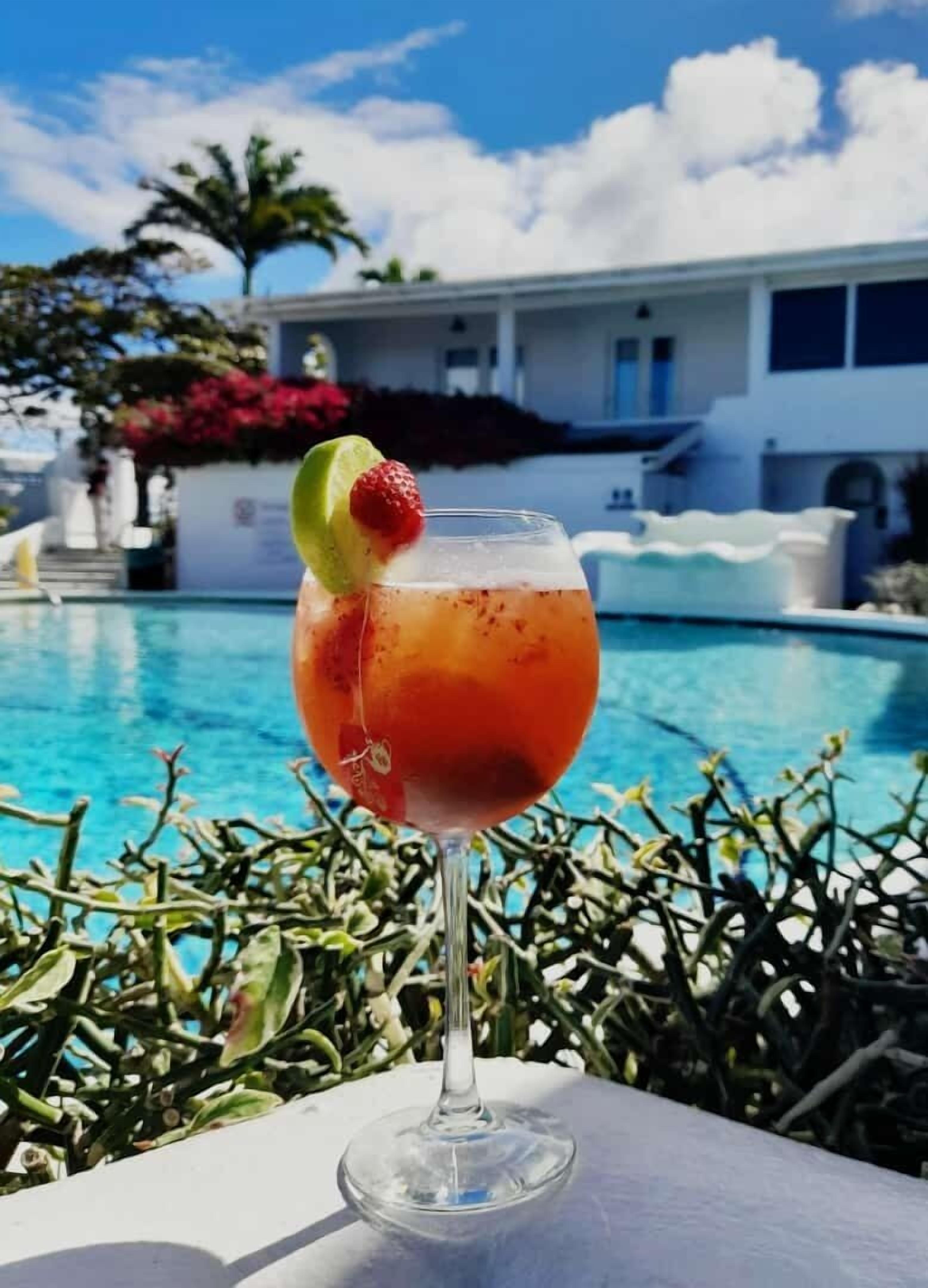 outdoor pool, open 7:00 am to 6:00 pm, pool umbrellas, pool loungers