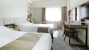 A hotel room with two beds, a desk, a chair, a TV, and a window with curtains. - Sapporo Tokyu REI Hotel (Sapporo)