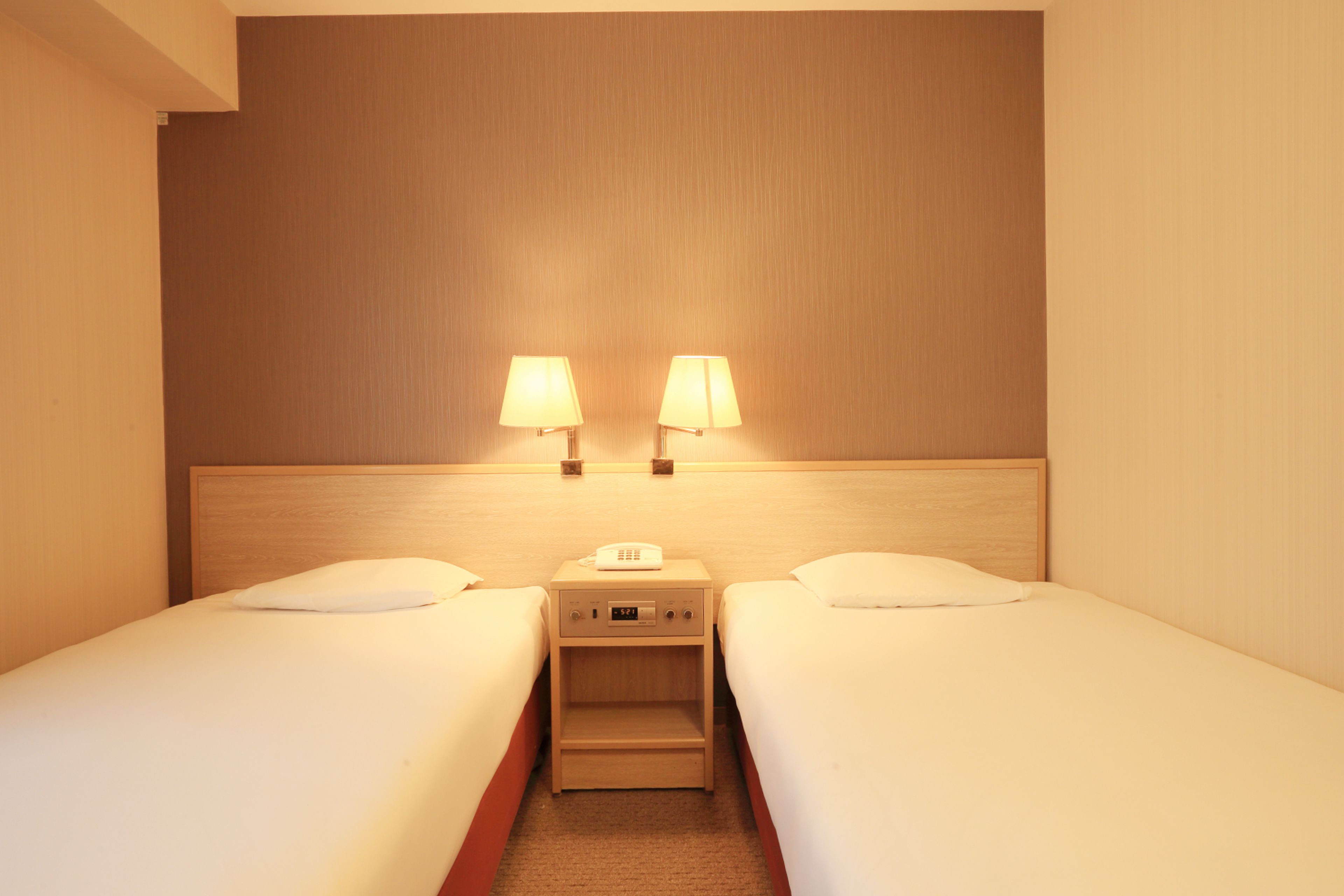 Down comforters, desk, blackout drapes, iron/ironing board